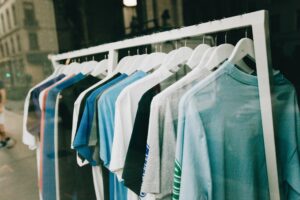 T-shirts on hangers, selling clothes, hangers, clothes, cleaning, laundry